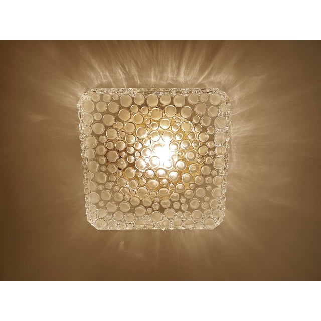 Mid century light featuring a bubble relief glass shade with bronze enameled base dimensions: height 24 cm / 9.44 in width...