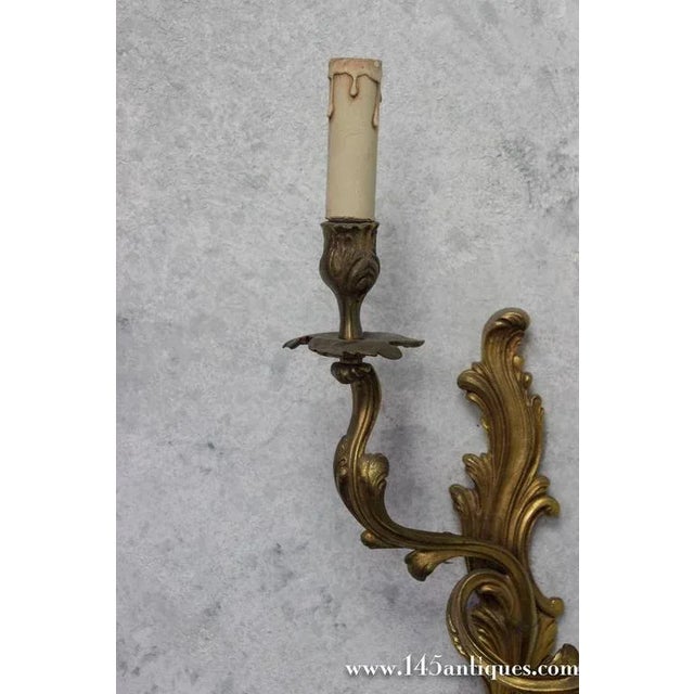 Early 20th Century Pair of French Louis XV Style Gilt Bronze Two-Arm Wall Sconces, 1920s For Sale - Image 5 of 10