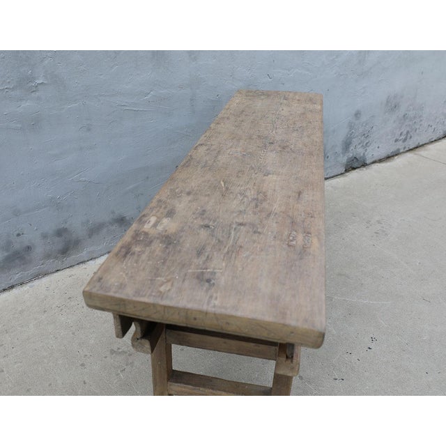 Antique Chinese Elm Dongbei Province Console Table, of traditional Dongbei style, with 2 apron sliders and small center...