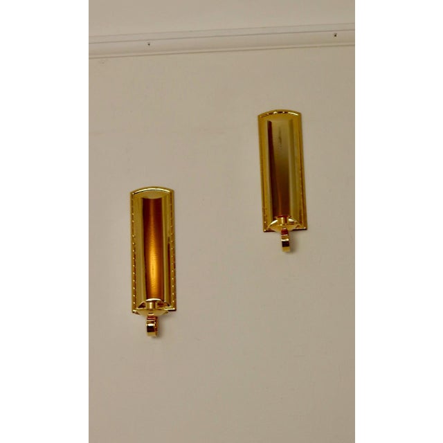 Pair Of Mid Century Style 24K Swedish Brass Sconces by Scandia Both sconces are in very good condition Signed: Scandia...
