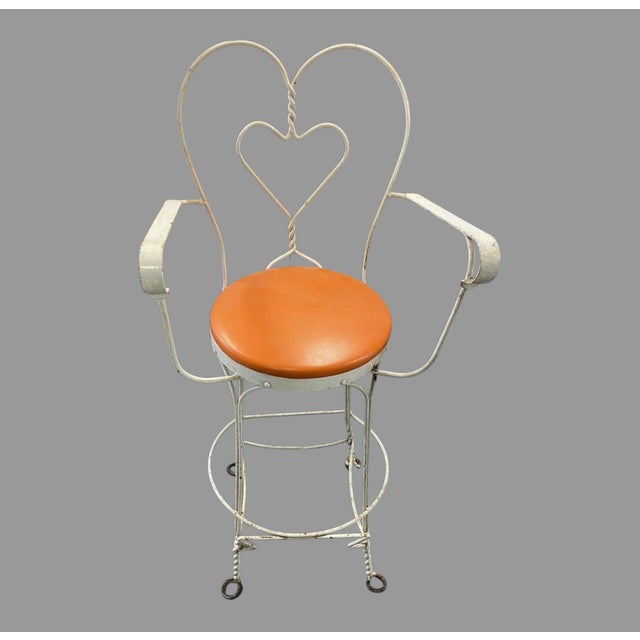 Pair of Vintage Ice Cream Soda Bar Barstool Chairs With Heart Shaped Backs These vintage wrought iron ice cream parlor bar...