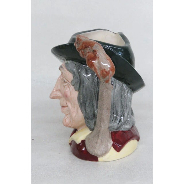 This charming Character Mug is made of porcelain. This interesting Toby Jug is titled Pied Piper D6462, made by Royal...