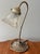Mid 20th Century Art Nouveau lily pad desk lamp with gooseneck stem. Made of cast metal with original gold gilded finish....