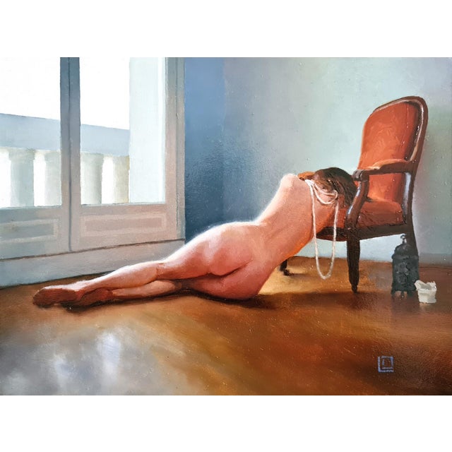 The Orange Voltaire II by Linda Delahaye | Oil on panel Nude figure reclining near a chair. For Sale