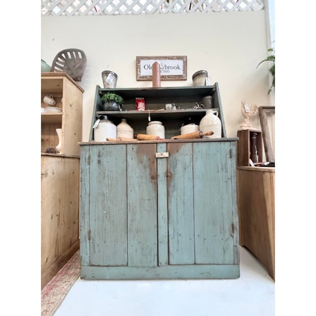 This 19th‑century antique pine hutch carries the kind of presence only a century of living can create—quiet, weathered,...