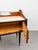 A splendid and authentic pair of Italian-made nightstands from the 1950s, in true Midcentury Modern style. The pieces...