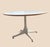 Classic Herman Miller Pedestal Table White laminate top with natural maple edge. Powder-coated, four-pronged, single...