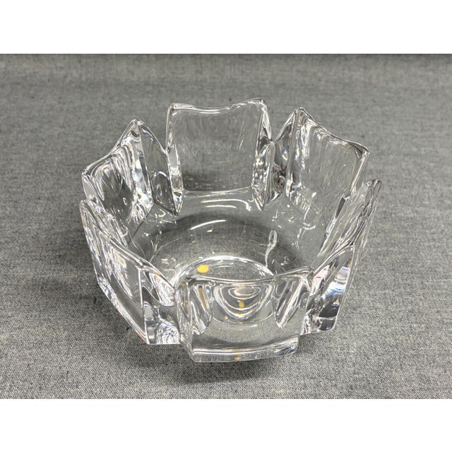 An impressive Orrefors Corona crystal bowl designed by Lars Hellsten. The vintage Swedish art glass piece features six...