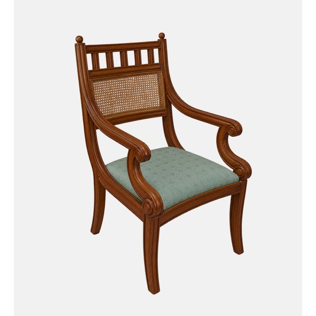 Vintage armchair with rattan back with muslin stuffed, light green fabric seat.