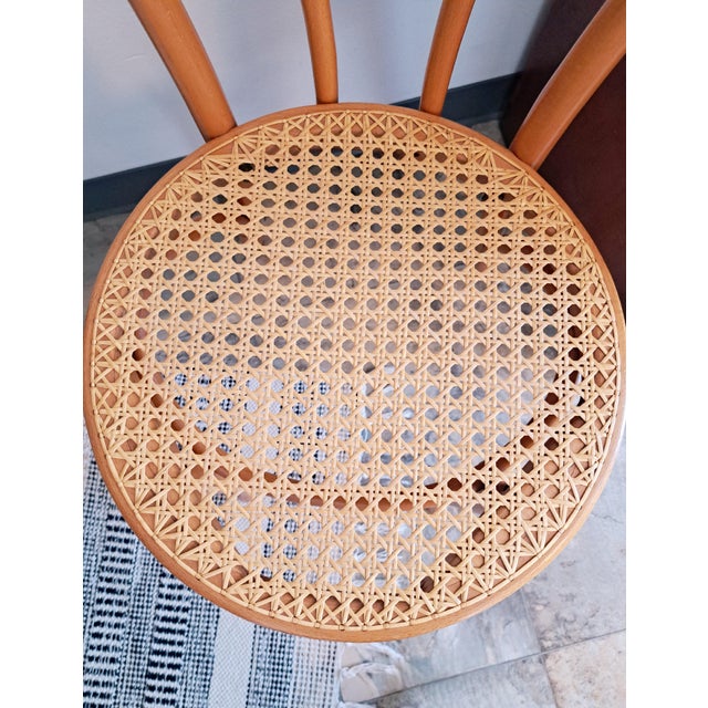 This original, made in Poland, FMG bentwood chair is a striking blonde oak color. The Thonet style, caned seat chair is so...