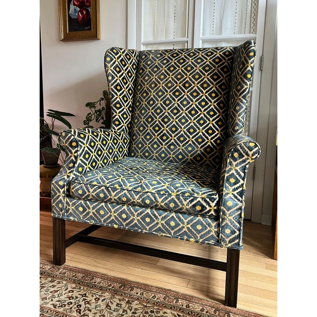 Overview: Inherited from a estate, this exceptional Chippendale-style wingback chair is a premier example of traditional...