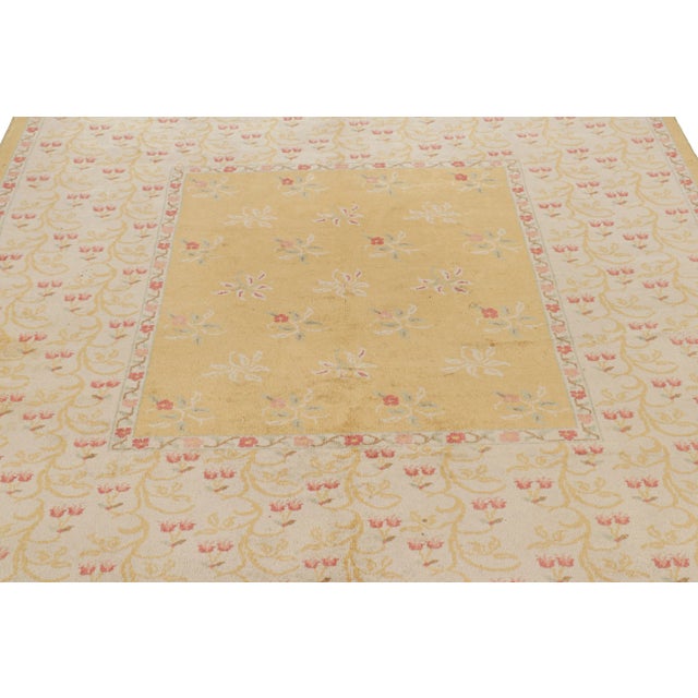 Made with hand-knotted wool in Turkey circa 1940-1950, this 5x7 vintage Oushak rug is an exceptionally rare and exciting...