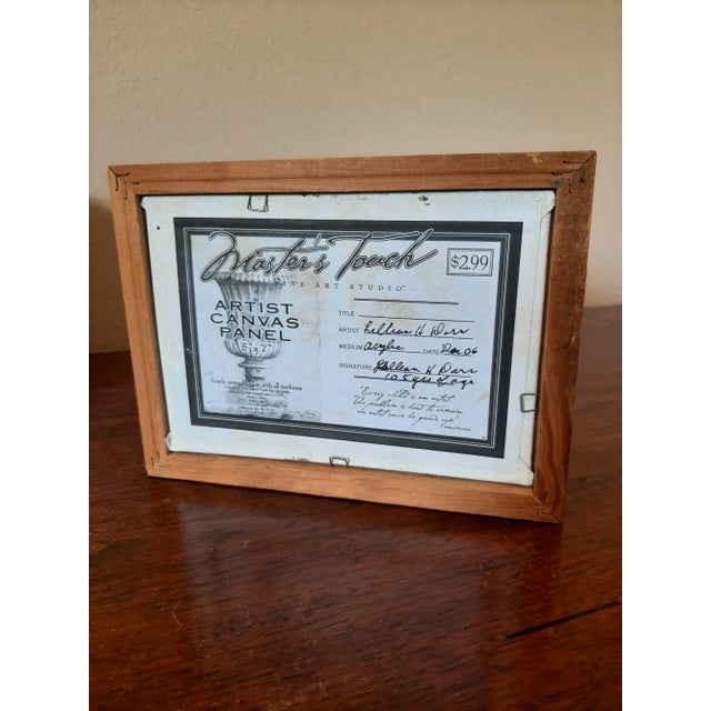 This original painting features a beautiful waterfall and mountain scene, presented in a wooden frame. The artwork focuses...