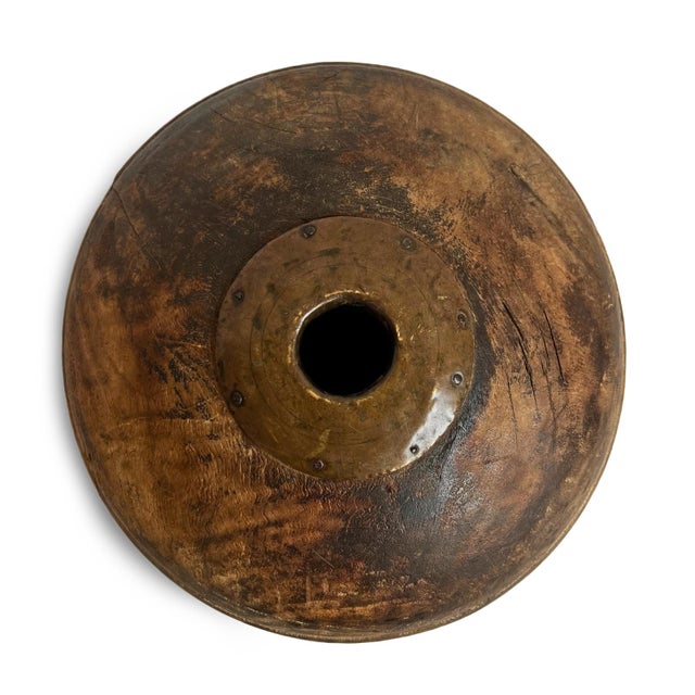 Antique old wooden tobacco container from India. Adorned with brass / metal decorative details. Each is unique and sold...