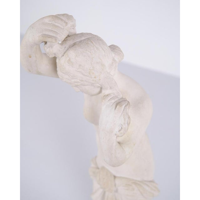Biscuit porcelain sculpture of a female figure from the 1920s in rare large size. Motif: Female figure, partially...