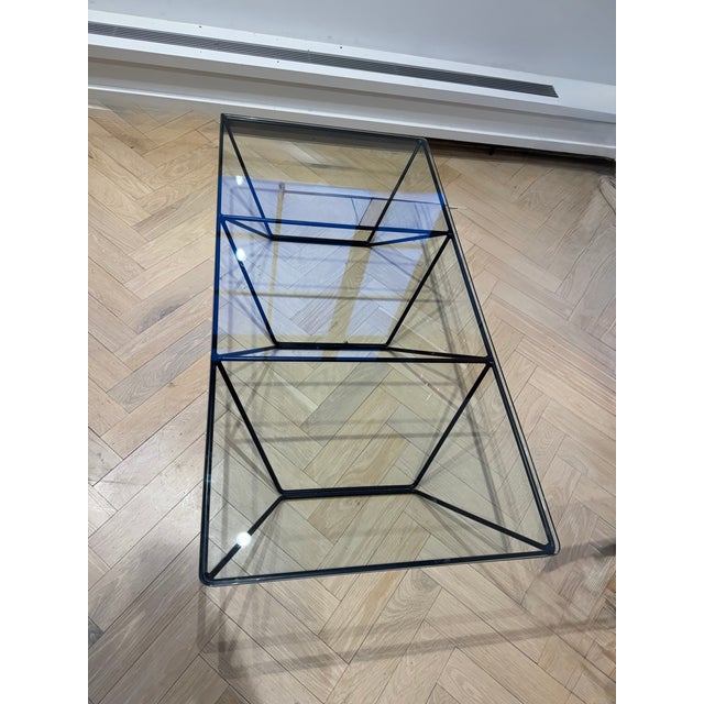 The Alanda coffee table, an iconic piece that ushered in the eighties. Attributed to Paolo Piva for B&B Italia, Alanda is...