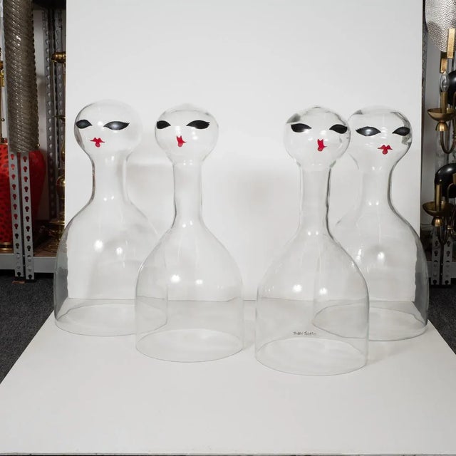 Rare, whimsical art glass sculptures attributed to Ruben Toledo. Each sculpture is slightly unique in shape and facial...