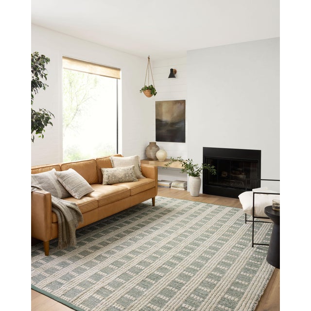 The Colton Collection by Angela Rose x Loloi is a new take on the staple jute rug, blended with cotton for added softness....