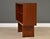 A mid century modern teak bookcase with adjustable shelves and brass accents. Professionally refinished. Made in Denmark....