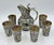 An exceptional Mid-Century Modern Mexican Alpaca silver and natural abalone shell beverage service consisting of a...