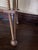 Folk art style end table in medium brown finish.
