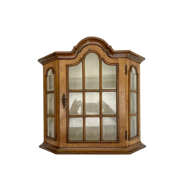 Vintage Wall Mounted Walnut wood small display cabinet with a arch top corniche and a painted inside with two carved...