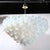 This stunning modernist chandelier is a testament to the unparalleled artistry of Murano glassmaking, featuring a sleek...