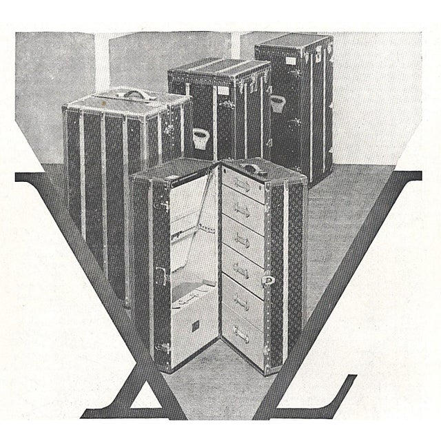 This is an original 1931 French Art Deco advertisement print for Louis Vuitton trunks. It features the classic upright LV...