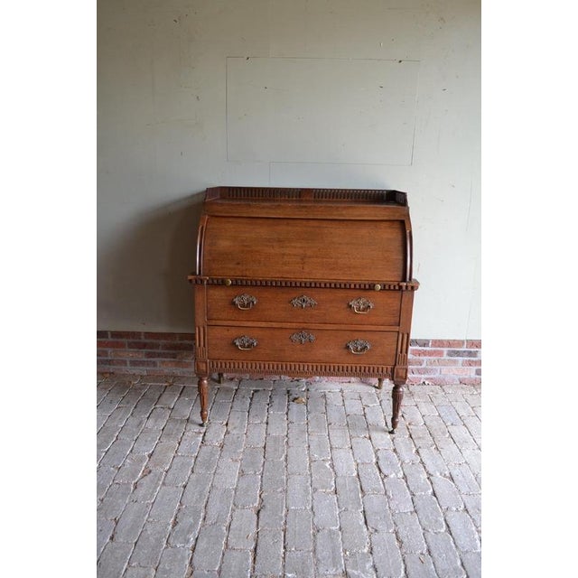 19th-century Dutch oak cylinder desk, writing desk. The height is 120 cm. The width is 108 cm. The depth is 58 cm. The...