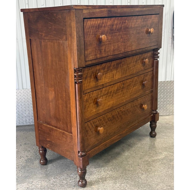 Stunning federal period Sheraton dresser features striking flaming birch drawer fronts and solid cherry case, four...
