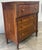 Stunning federal period Sheraton dresser features striking flaming birch drawer fronts and solid cherry case, four...