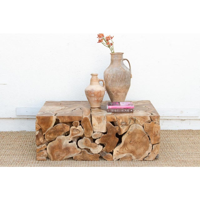 This 48-inch coffee table is a sculptural masterpiece of Biophilic Design, bringing the raw, untamed beauty of the...
