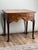 This elegant George III mahogany lowboy, dating to the late 18th century, is a wonderful example of classic English...