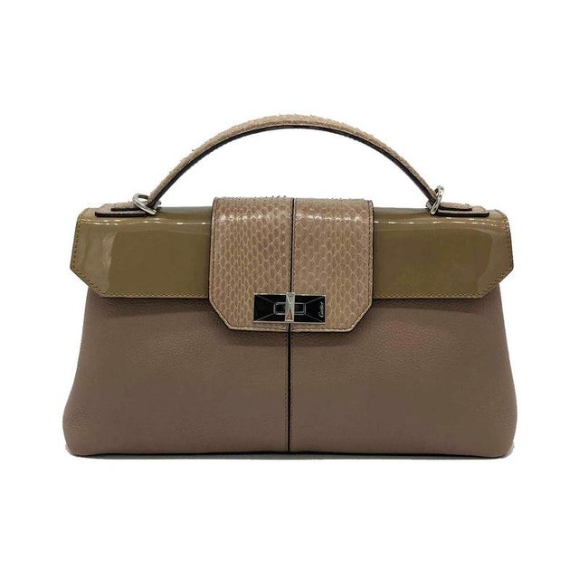 Cartier Classic Beige Feminine Line Top Handle Bag in very good condition. light wear on bottom. clean corners and...