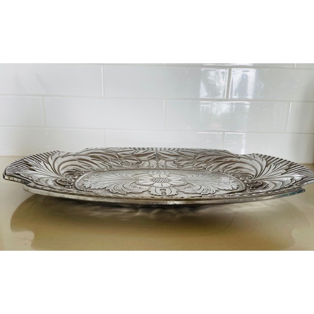 Gorgeous large pewter embosed vintage tray by the Wilton Company. Cleans easily and will not tarnish. This is a quite...