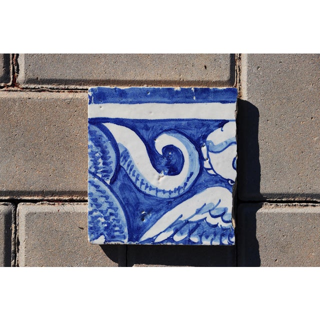 Circa: 18th Century. Country: Portugal. Material: Earthenware, Tin-glazed pottery. Note: This tile was once part of a...