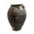 Antique earthware clay pot found on the coast of Java. Stunning unique piece with dark aged patina and embedded shells and...