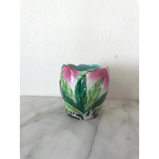 We love the vibrant colors of this darling cup! Did you know peaches in China are a symbol for longevity?