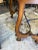 This is a striking pair of Italian burl walnut demilune console tables with iron stretchers. They are Italian and most...