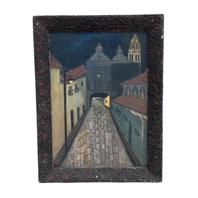 A charming pair of small naive style oil paintings depicting moody, moonlit cobblestone streets winding through colonial...
