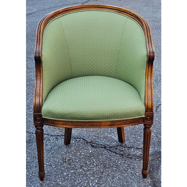 Italian Made Regency Style Walnut and Upholstered Barrel Back Chair in very good vintage condition. The green upholstery...
