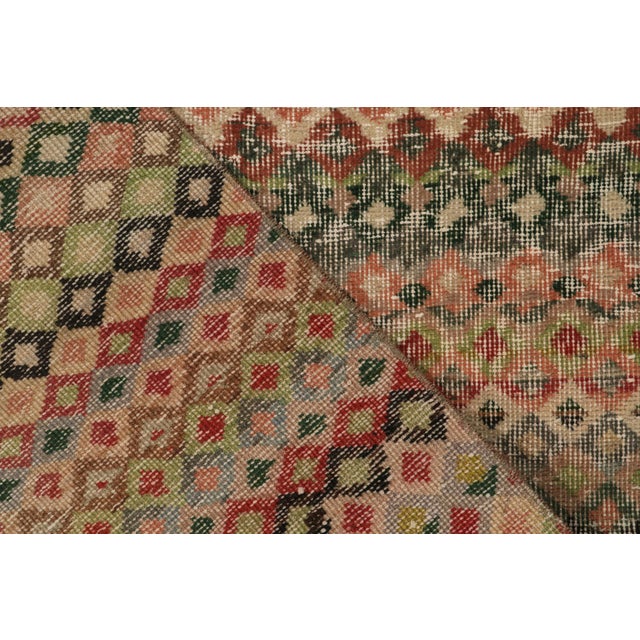 Textile 1960s Vintage Turkish Rug in Red, Green and Pink Geometric Pattern, Distressed For Sale - Image 7 of 7
