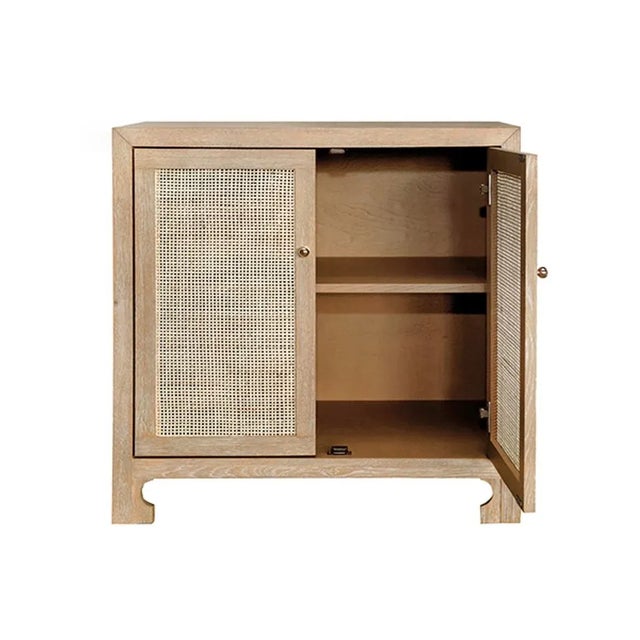 Handsome two door oak cabinet with cane doors and brass hardware. 30" W X 30" H X 18" D Cane has natural variations and...