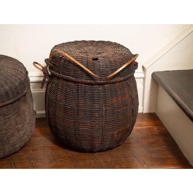 Collection of authentic 19th century African baskets from Mali, handwoven in natural reed and cane with beautifully aged...