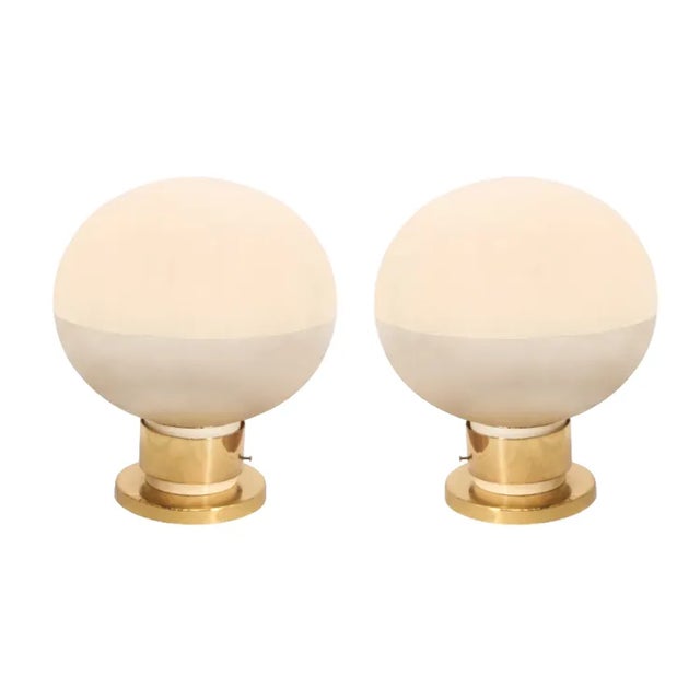 The Pair of Vintage Motoko Ishii German Space Age Brass Flushmount or Sconce for Staff is a remarkable find that will...