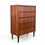 Vintage 5-Drawer dresser crafted in teak with conical teak legs and dove-tailed drawers. Made in Denmark.