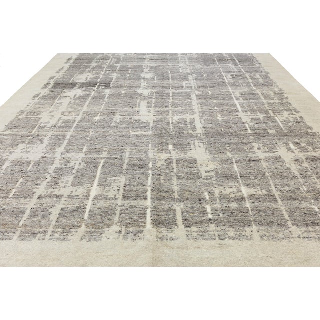 Elevate your living space with this sophisticated Modern Geometric Wool Rug, a perfect blend of minimalist design and...