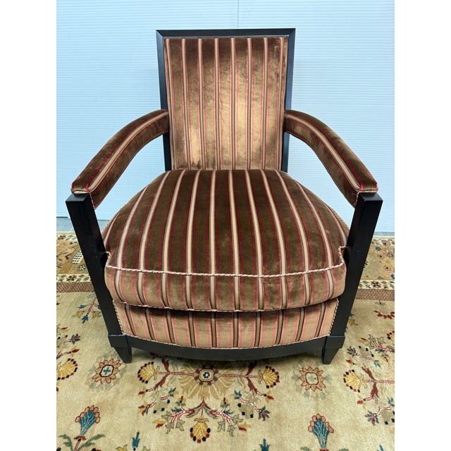 Design Plus Gallery presents a Lounge Armchair from Donghia. The upholstered chair has a tailored silhouette with an...