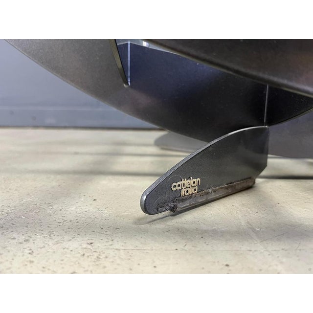 Model 'Atlas' coffee table designed by Nencini & Brothers and manufactured by Cattelan Italy. it consists of a crossed...