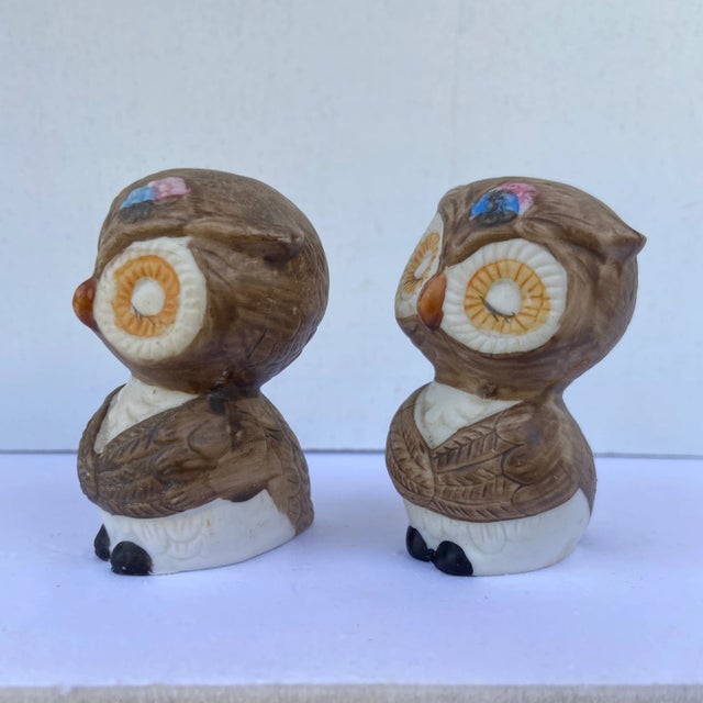A pair of cutie pie owl salt and pepper shakers. These were made in South Korea. The colors are bright and vibrant. The...